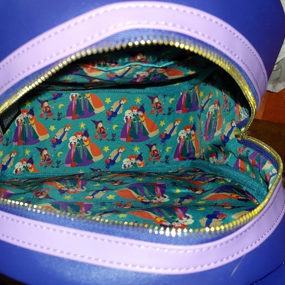 Glow In The Dark. Loungefly Disney Haunted House Backpack - Blue and Purple